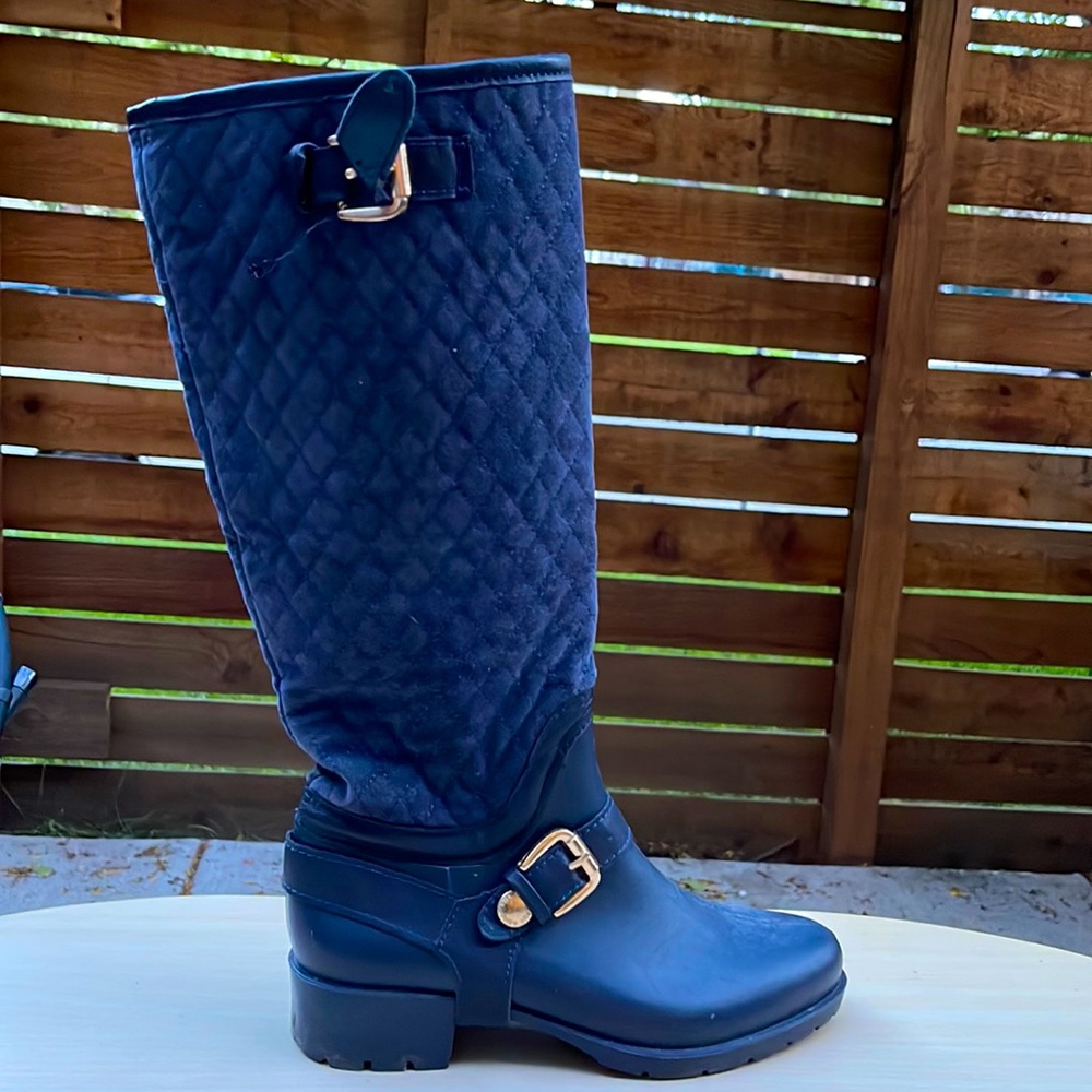 Navy two-tone boots with velvet detail and gold buckles